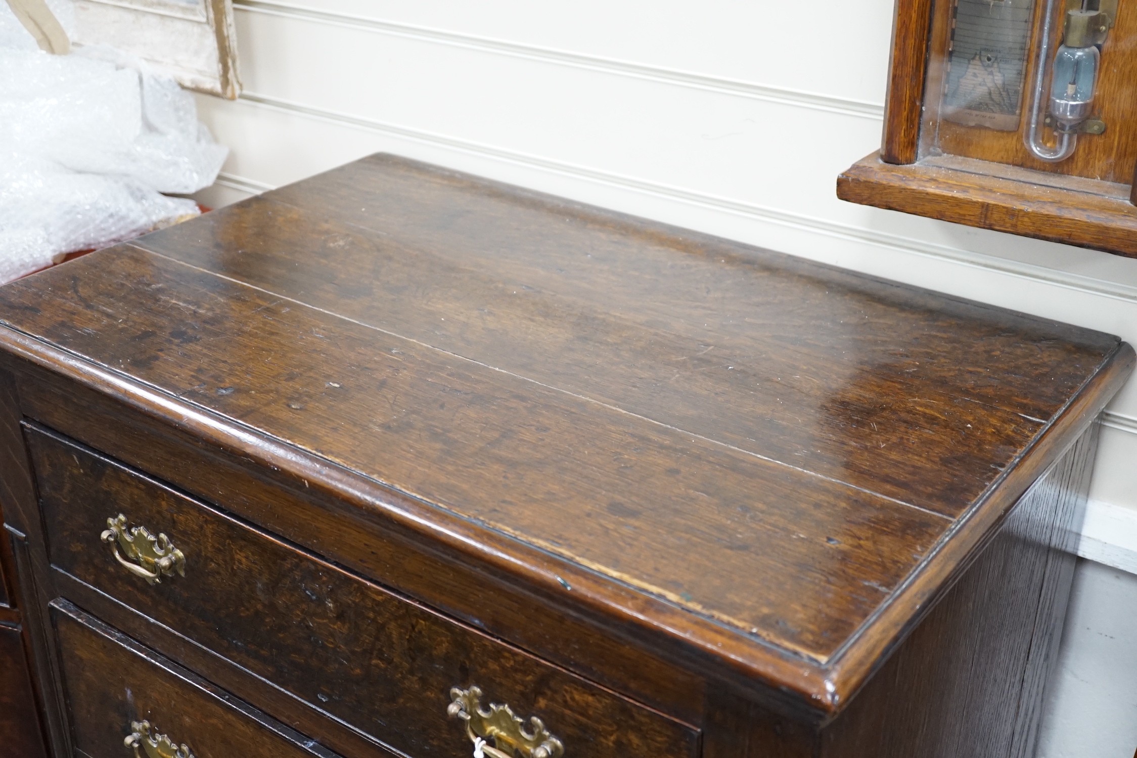 An 18th century style oak four drawer chest, width 75cm *Please note the sale commences at 9am.
